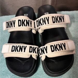 DKNY SZ. 7 1/2 black and white Logo adjustable Strap Sandals/slides